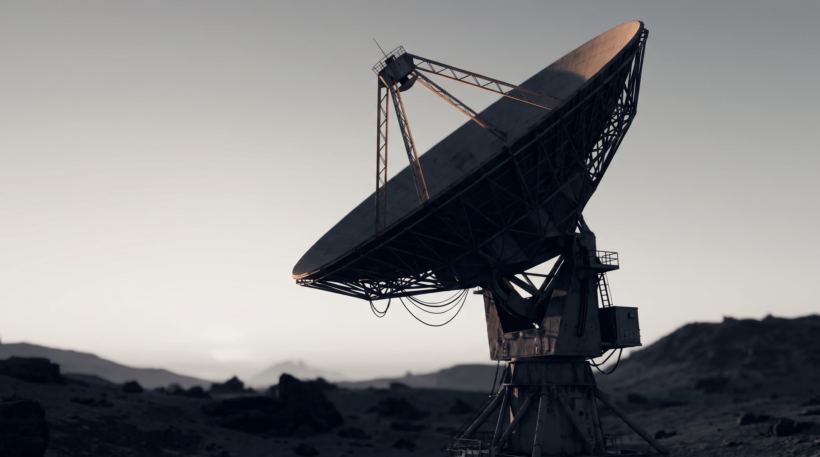 A large parabolic ground-station antenna against the sky